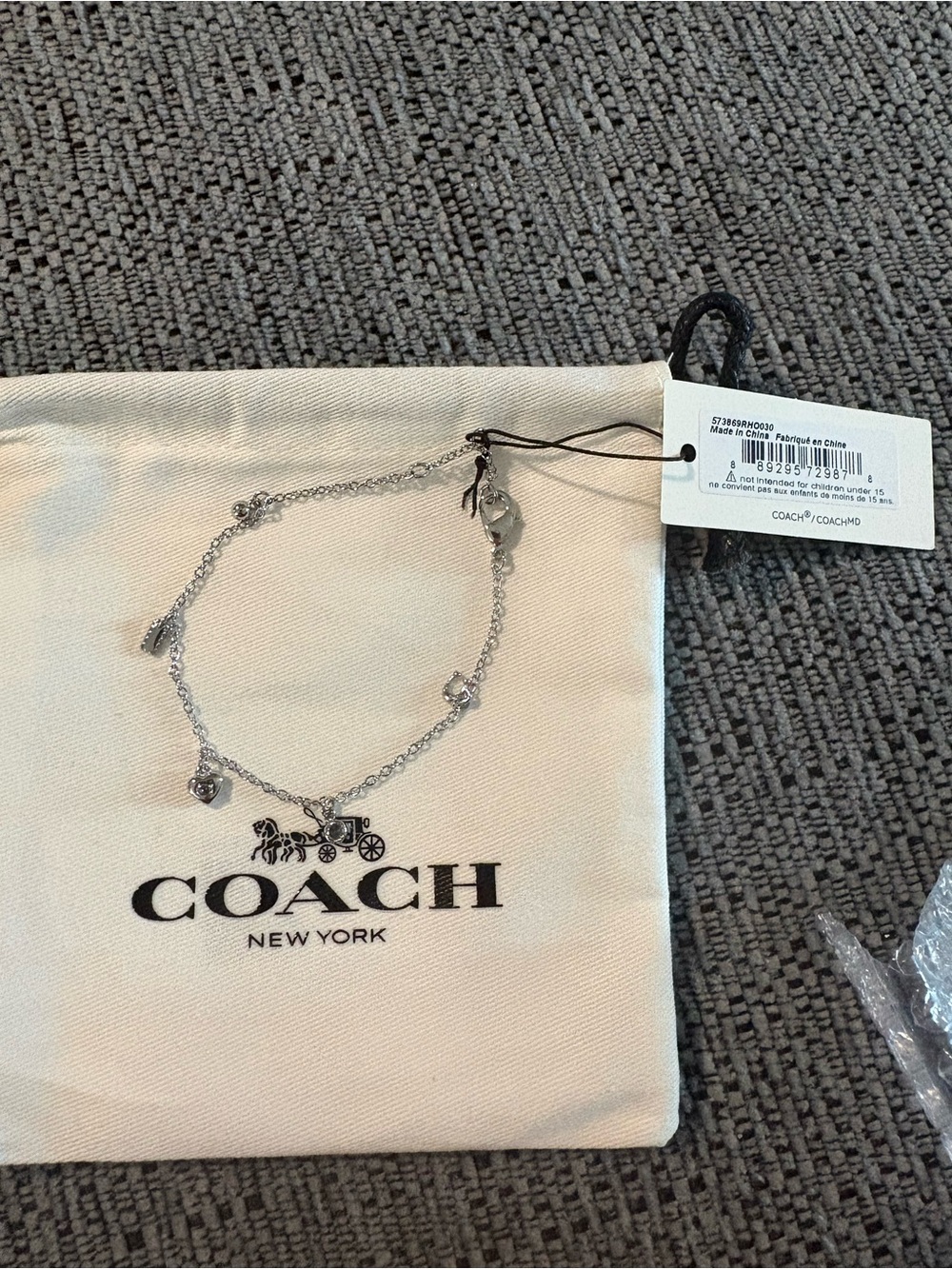 COACH Silver Charm Bracelet with Signature Carriage Charm